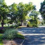 Mature trees and arboretum landscape at Woodside Cemetery
