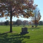 Mature trees and arboretum landscape at Woodside Cemetery